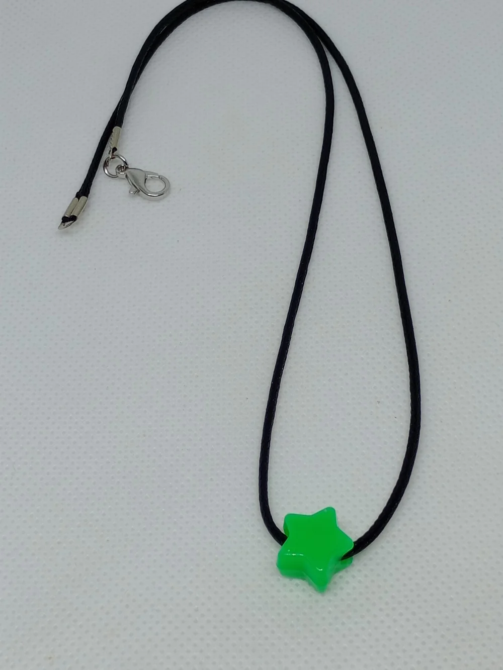 Green Star Pendant Necklace on Black Cord